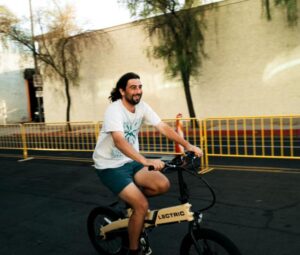 Riding bicycle Noah Kahan